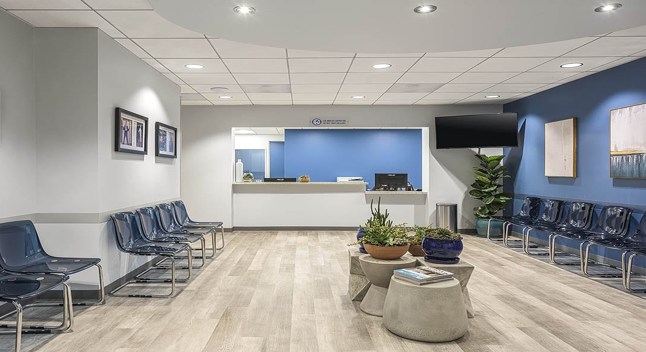 Modern waiting area with sleek seating and decor.